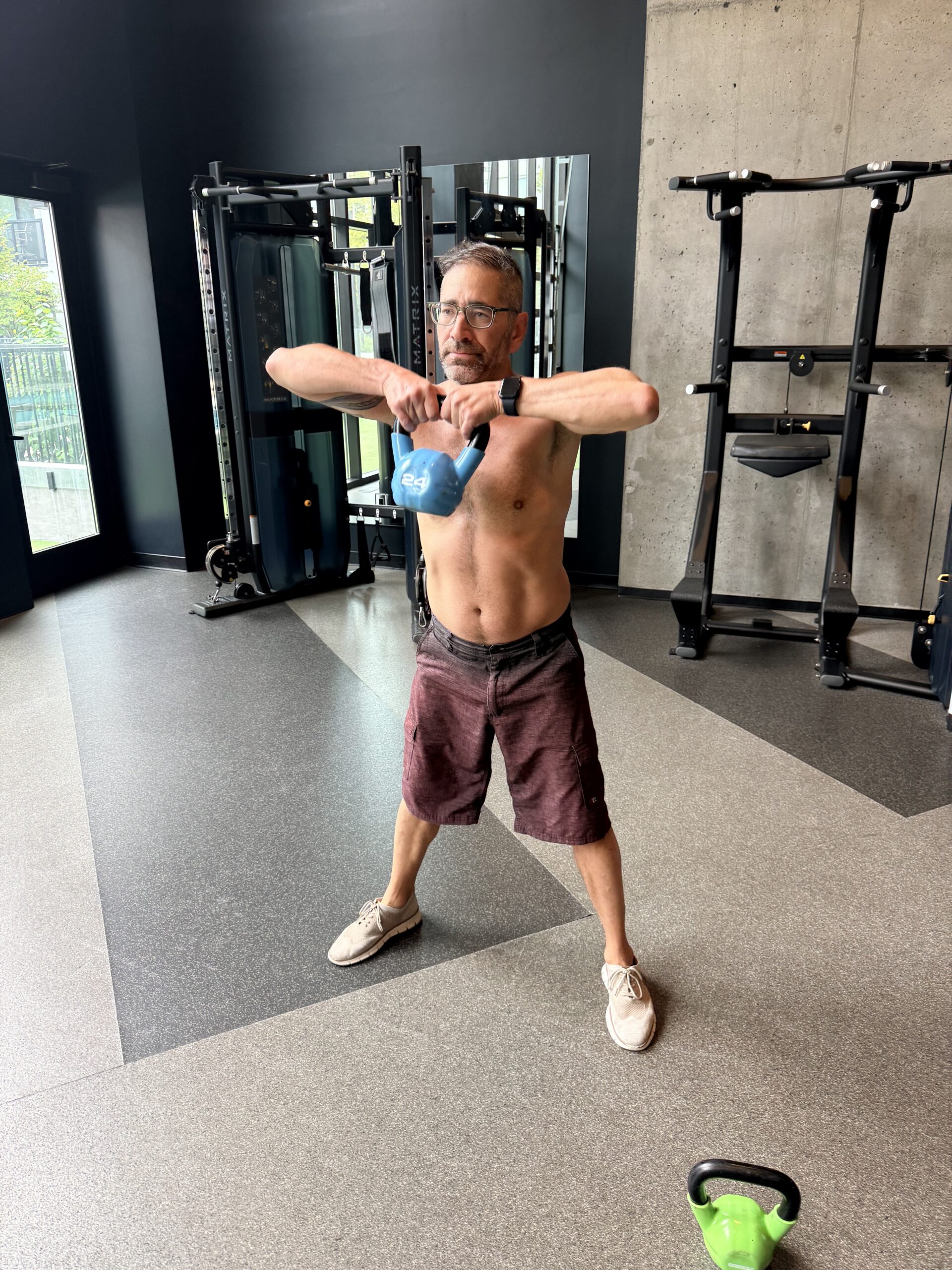 A resident doing a kettlebell upright row